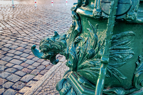 Historic water pump in the old town district of Rixdorf in Berlin.