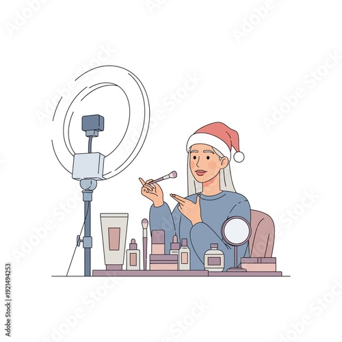 Young woman in a Santa hat applying makeup in front of a ring light for a holiday vlog.