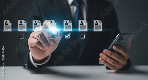 Digital Data Verification: A professional figure navigates a digital interface on a mobile device, confirming essential information or data points with a precise touch.
