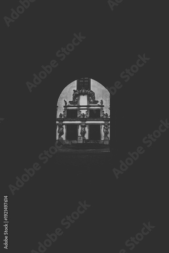 Detailed view of ornate Baroque window with Corinthian columns and stone carvings