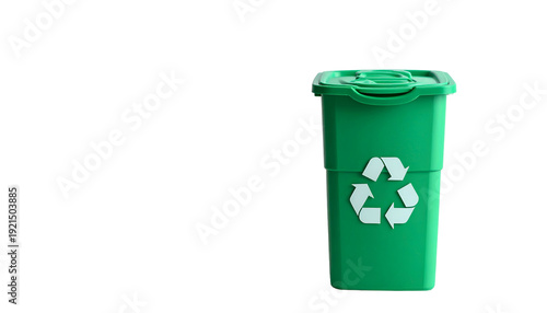 A green bin with a recycling symbol on a black background