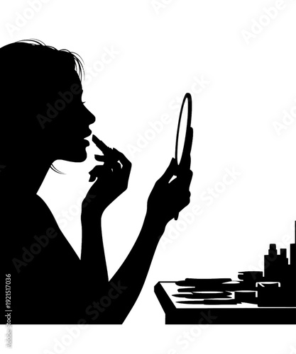 Woman applying makeup with mirror in professional beauty salon setting black and white