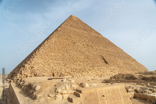 Detailed view of the ancient limestone blocks at the base of the Great Pyramid of Cheops (Khufu), Egypt