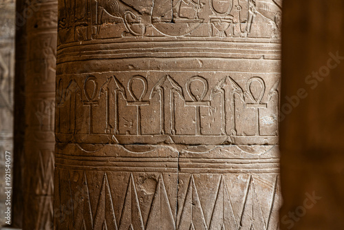 Deeply Carved Ancient Egyptian Ankh and Was Sceptre Symbols on a Sandstone Column at Edfu Temple in Egypt