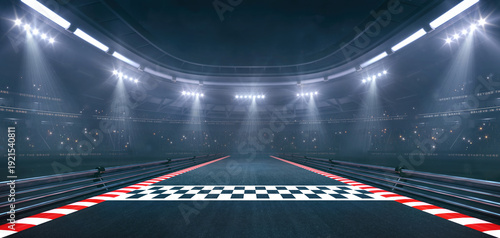 Finish line at a sports racing circuit in foggy weather with shining floodlights and fans ready for an upcoming nighttime sports event.