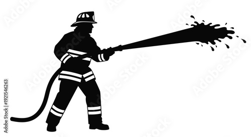 Silhouette of a firefighter powerfully directing a stream of water