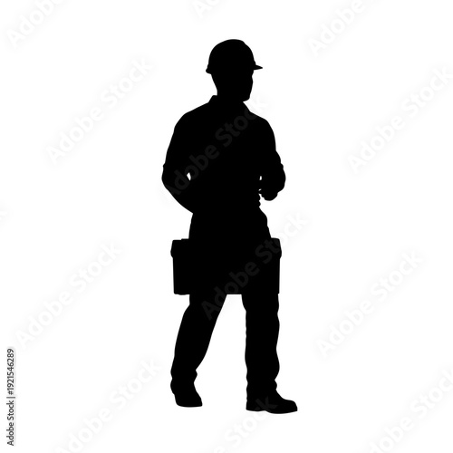 Silhouette of a Construction Worker in Protective Gear, Walking.