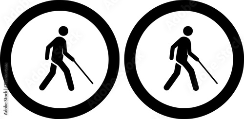 Two pedestrian crossing signs with cane silhouette
