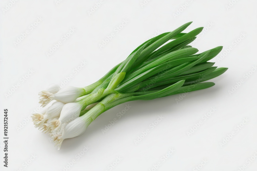 Fototapeta premium Fresh spring onions on white background