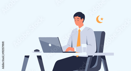 Businessman working late at night on laptop.