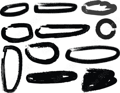 A collection of abstract black brushstroke shapes on a white background
