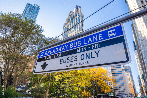 Canvas Print Broadway bus lane sign with buses only restriction above Manhattan street in New