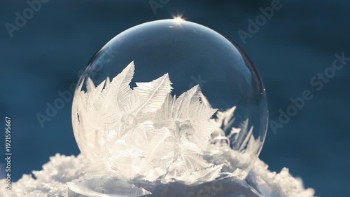 Freezing soap bubble forming ice crystals