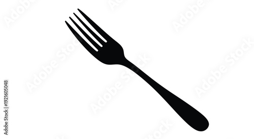 A simple black fork depicted in a stark dramatic silhouette