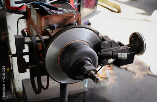 Wallpaper Mural Brake disc skimming, Grinding machine working to rebuild surface brake disk. Brakes Repair Auto Service. Car Brakes Servicing. Car Maintenance. Auto Service. Torontodigital.ca