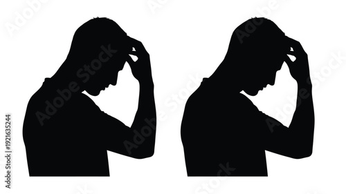 Two silhouettes of people with heads in hands expressing distress

