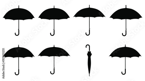 A collection of black umbrella silhouettes in various styles and positions