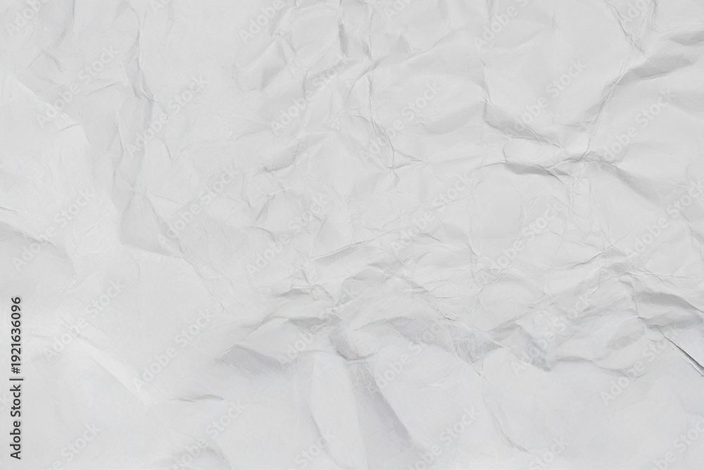 Obraz premium Sfondo di carta bianca stropicciata con texture rugosa e ombre profonde