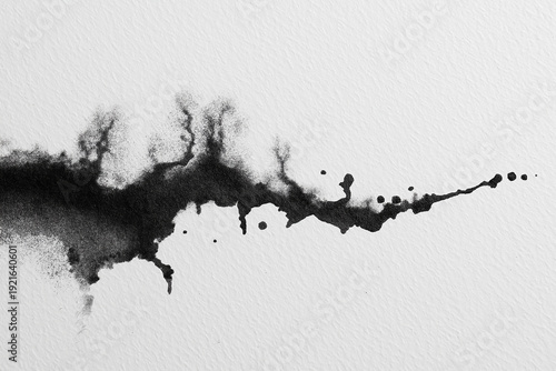 Abstract black ink bleed on textured white paper, artistic watercolor stain with splatters for minimalist background design