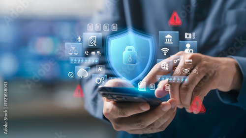 Cybersecurity and data protection concept. businessman using a mobile phone with a lock icon for internet network security and AI technology. Cybersecurity and privacy management on cloud computing.