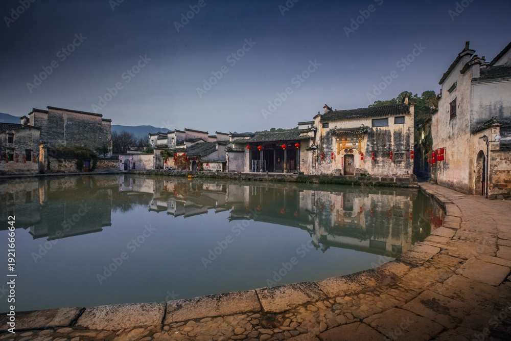 Fototapeta premium Hongcun Ancient Village, Anhui Province China at Night with Moon