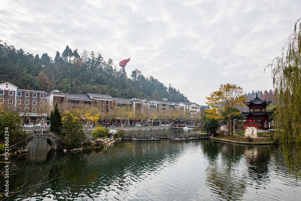 Fototapeta premium Jinggang Mountain Lake Town with Traditional Chinese Pagoda and Architecture