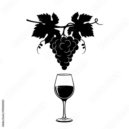 A single glass of red wine with a grapes