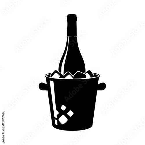 Elegant silhouette of a wine bottle chilled in ice bucket, ready for enjoyment.