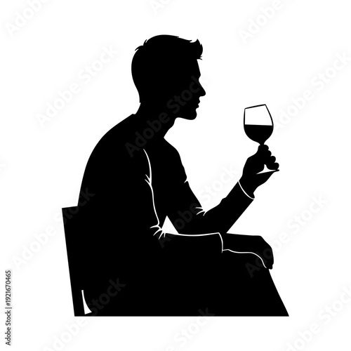 Silhouette of a person enjoying a glass of wine