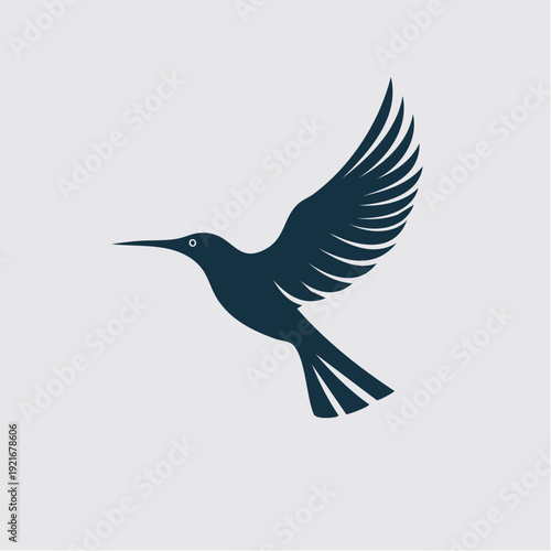 Silhouette of a hummingbird in flight, a symbol of grace and agility