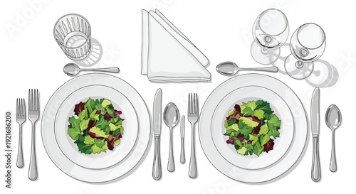 Elegant table setting with fresh salad plates and fine dining utensils