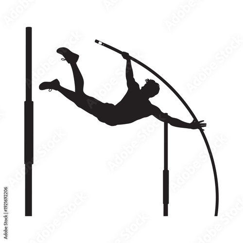 Silhouette of a pole vaulter mid air clearing the bar successfully