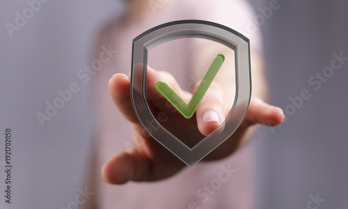 A person's hand holding a s...