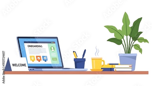 Modern office desk workspace with laptop plant books and coffee cup.