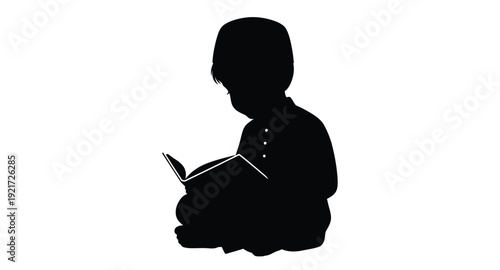 A young person intently reading a book depicted as a silhouette