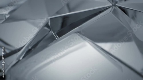 Geometric Abstraction Focus on sharp lines, symmetrical forms, and repeating patterns created by light and reflection.