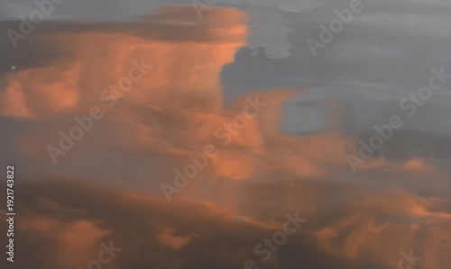 Reflection of the sky and clouds in the surface of the water