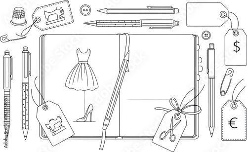 Collection of black and white fashion design tools and stationery items laid out for creative work including price tags, writing instruments, and sewing notions.