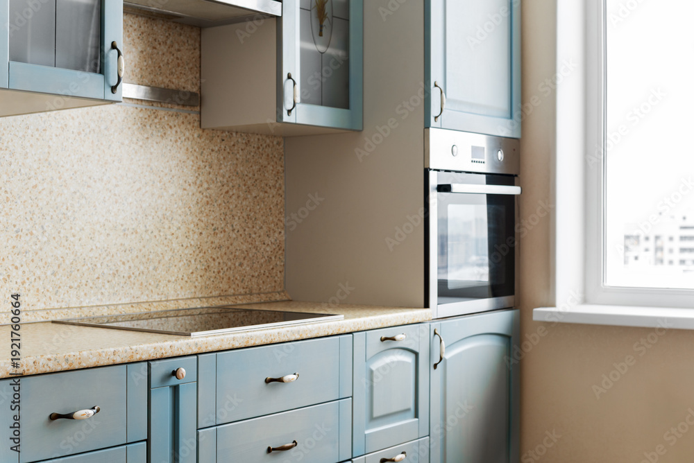Fototapeta premium Modern kitchen interior with cabinets