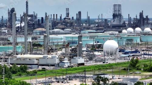 Aerial of Oil and gas refineries and factories at work in Good Hope, Louisiana during summer