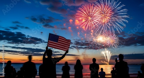 Patriotic fireworks display on a summer evening by the ocean