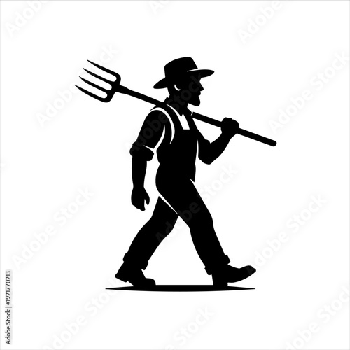 Silhouette of a farmer walking while carrying a pitchfork over his shoulder against a clean white background