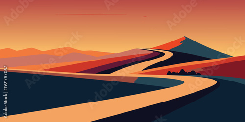 A winding road leads to a distant mountain range at sunset