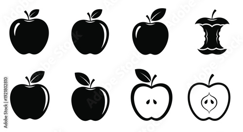Black and white illustration of whole halved and cored apples with core remnant