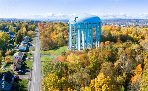 Valokuva Aerial view of large municipal water tower on a sunny autumn day, Troy, NY, with