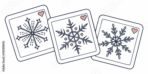 Three distinct snowflake designs on separate cards with decorative borders and symbols