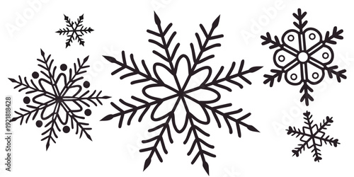 Intricate black and white snowflake designs with varying levels of complexity