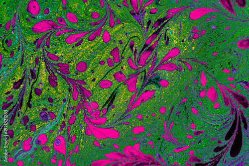 Vibrant psychedelic floral Ebru marbling art background with swirling liquid paint textures