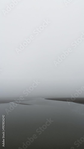 Winding River Bend in Dust Haze