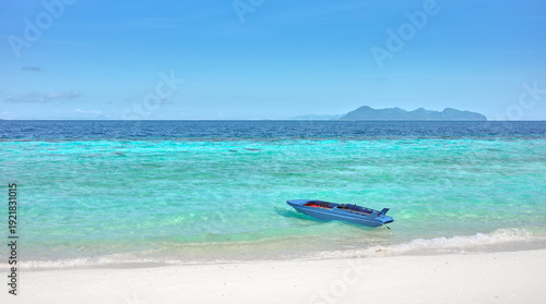 A small boat by the beach, Semporna district, Borneo, Malaysia.